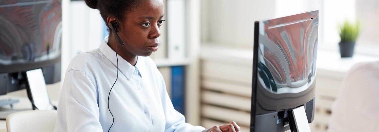 woman looking at computer