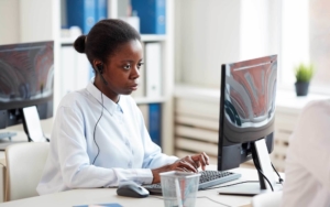 woman looking at computer