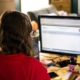 Woman looking at computer monitor