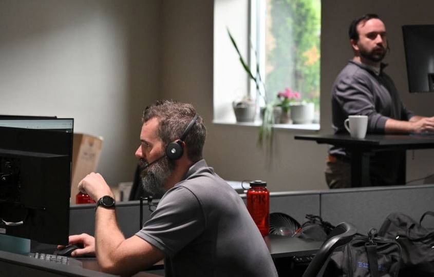 Office team improving workflow efficiency using practical AI tools