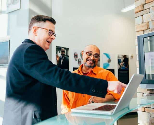 Small business owner in Northeast Ohio reviewing AI strategy with PCR consultant
