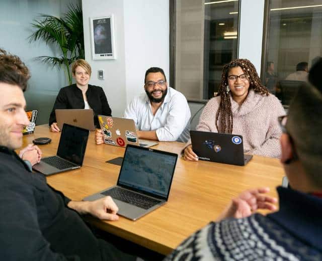 Northeast Ohio business team using AI tools inside Microsoft 365 to improve efficiency